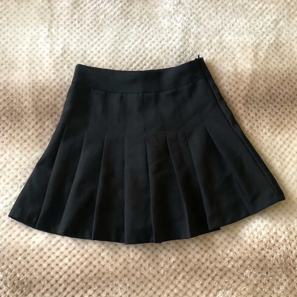 Black mini tennis skirt